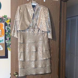 Beautiful golden evening dress with gem detailing.